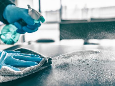 Cleaning,Home,Table,Sanitizing,Kitchen,Table,Surface,With,Disinfectant,Spray